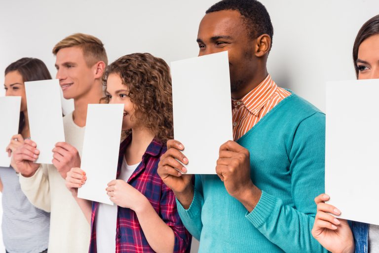 People are covering their faces with white paper